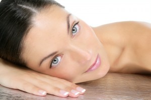 Relaxed woman with clear skin showcasing Ethemba Healths beauty expertise